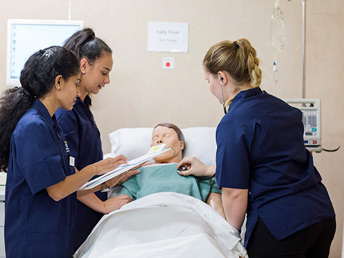 UCOL nursing learners administrating a dummy patient